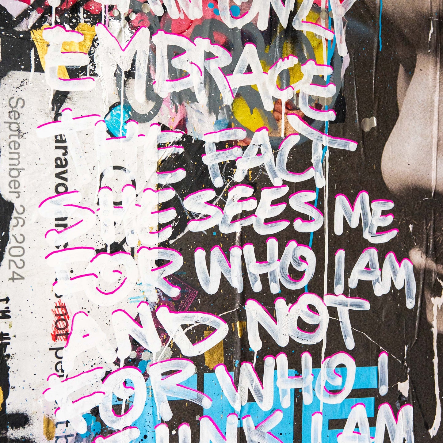 Colorful graffiti-style text on a textured surface with a calendar in the corner.