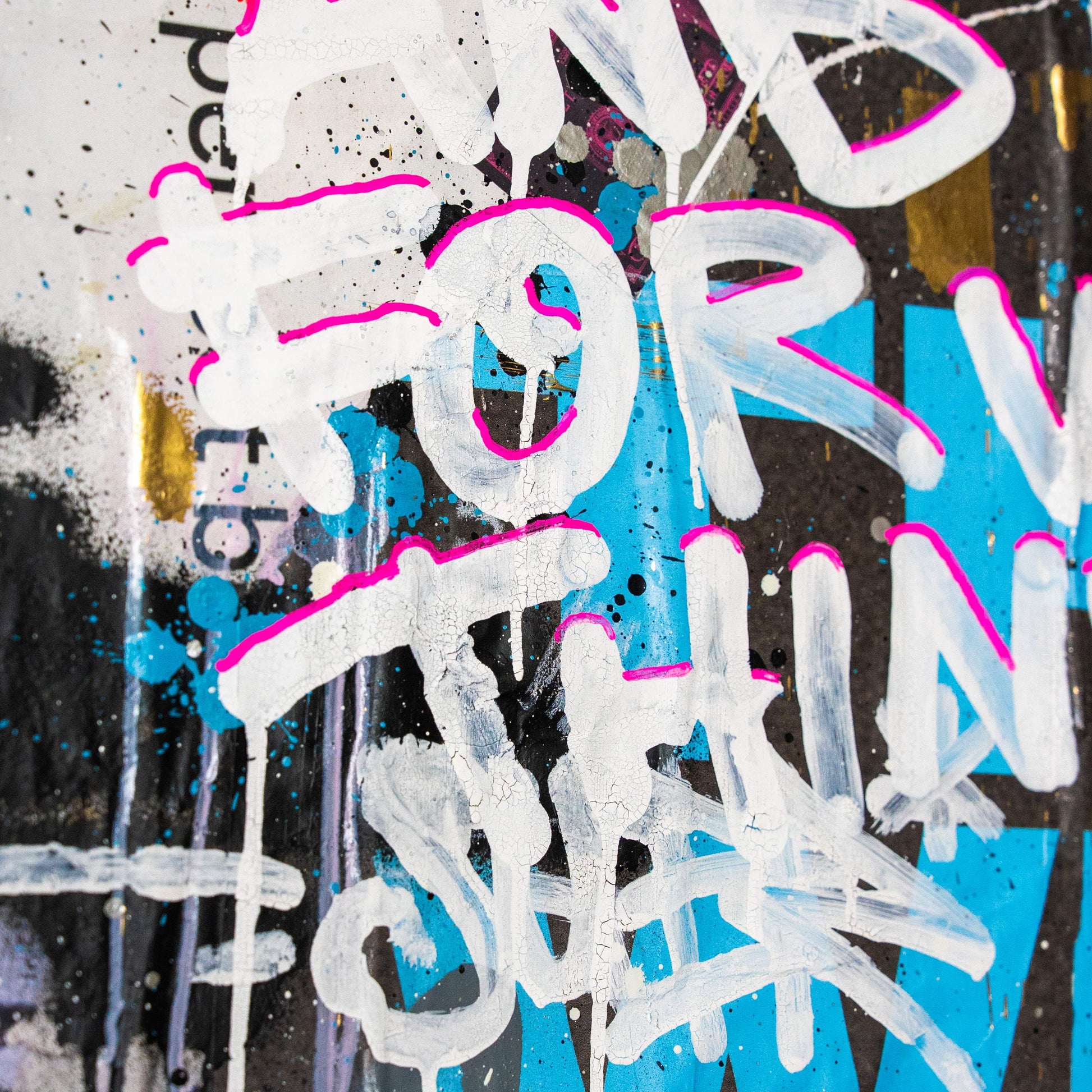 Graffiti-style text with white, pink, and blue colors on a multicolored background