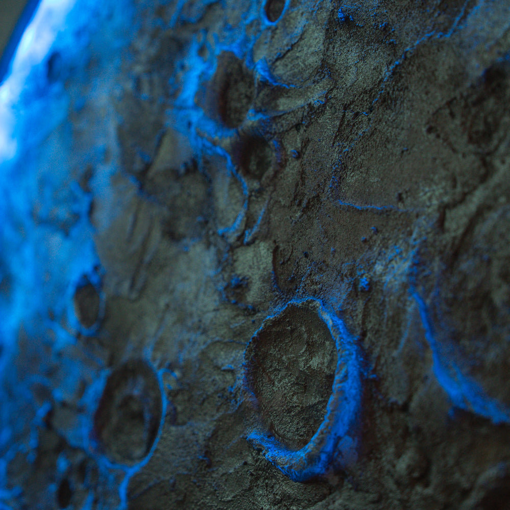 Close-up of a textured surface with blue accents
