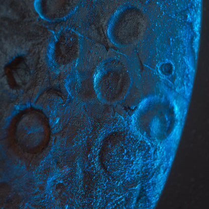 Close-up of a textured blue surface with circular patterns