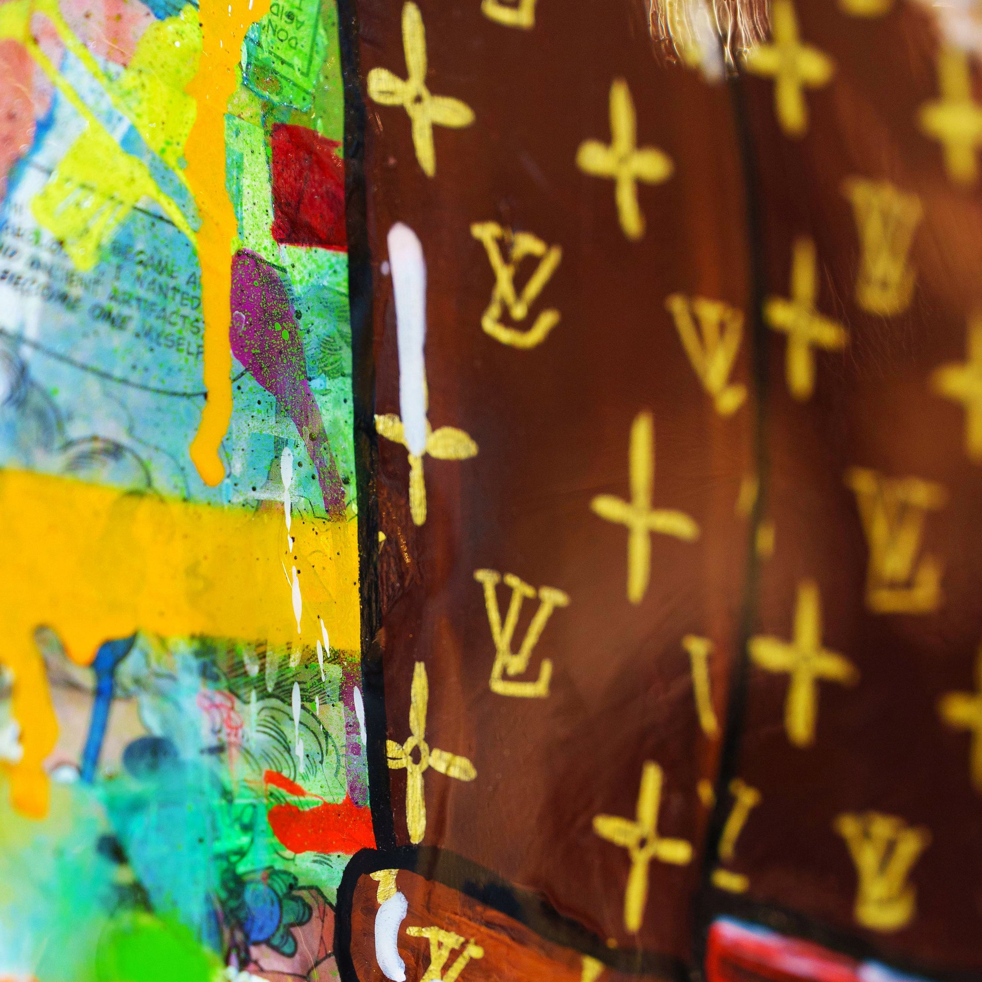 Close-up of a colorful object with a patterned fabric background