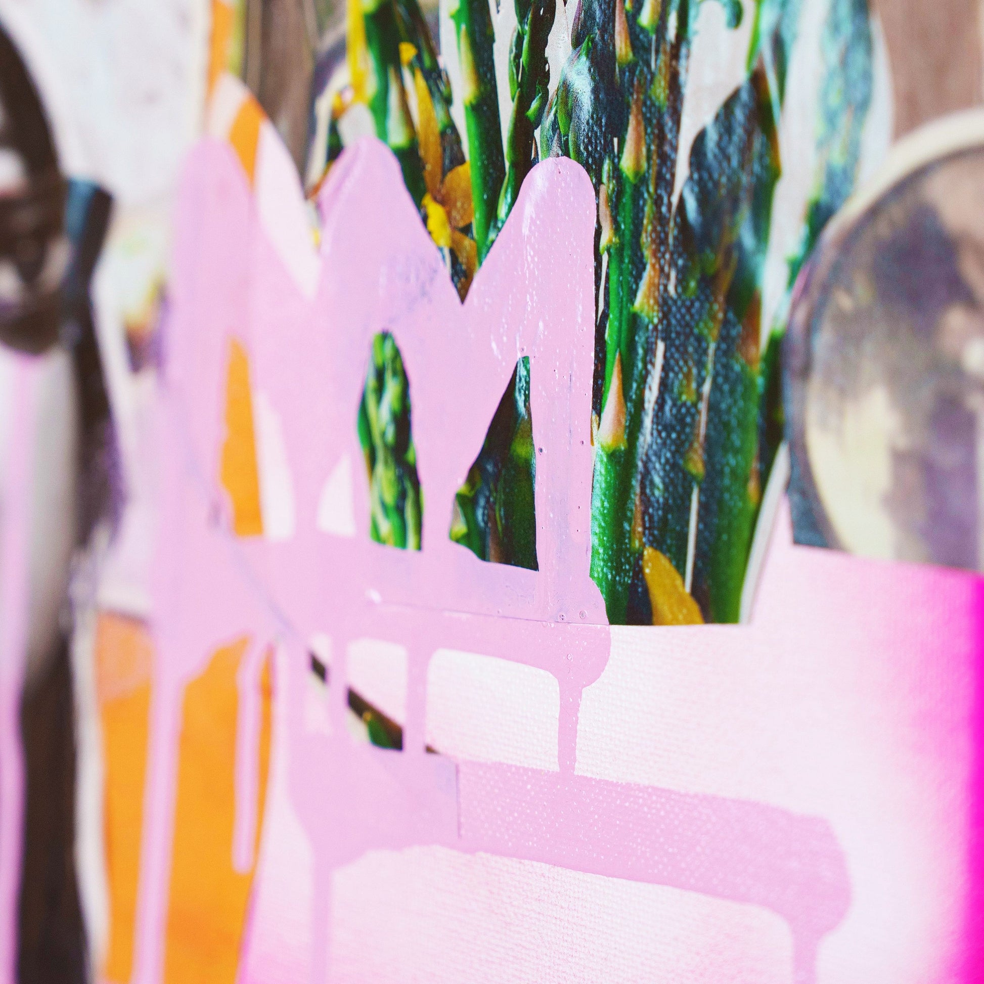 Close-up of a pink decorative item with blurred floral background